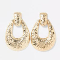 Gold colour textured doorknocker earrings